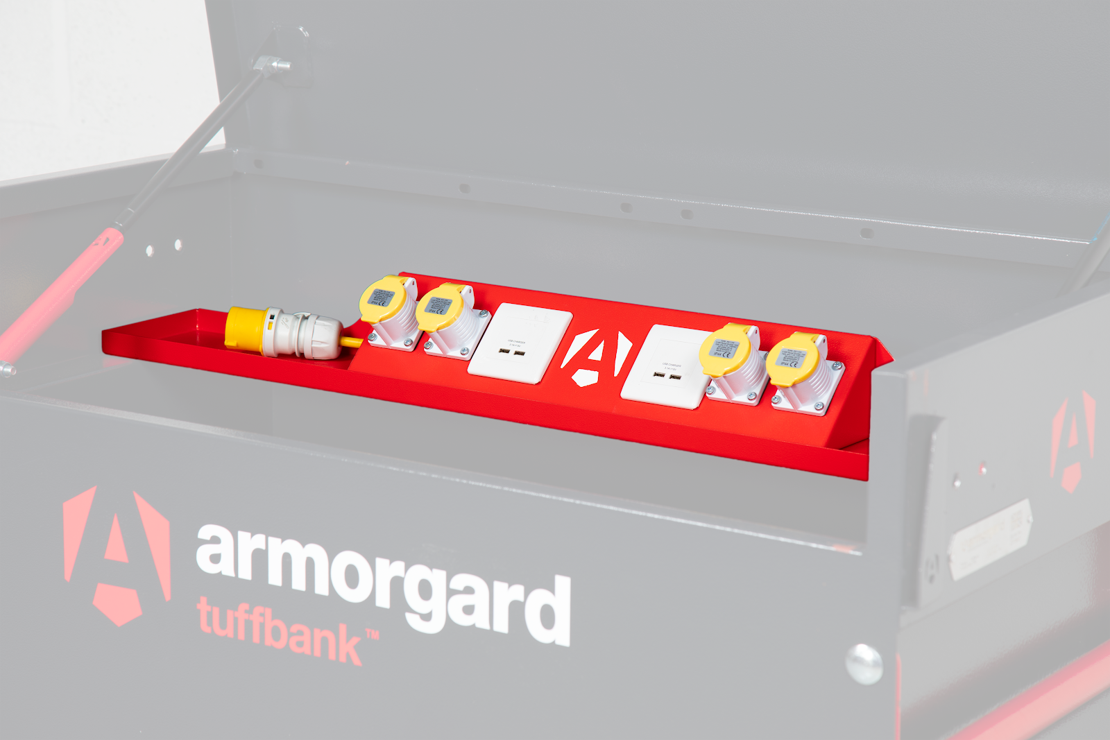 An Armorgard tuffbank with a red and yellow charging station attached to it