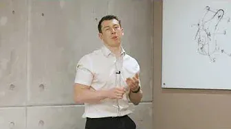 a man giving a talk