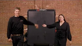 two people standing in front of an Armorgard product